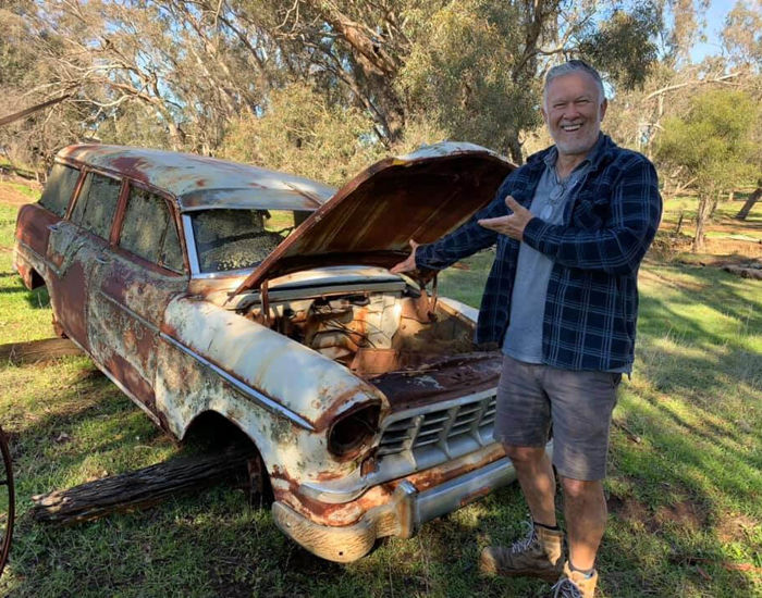 Steve Erceg With A Rusty Old Car